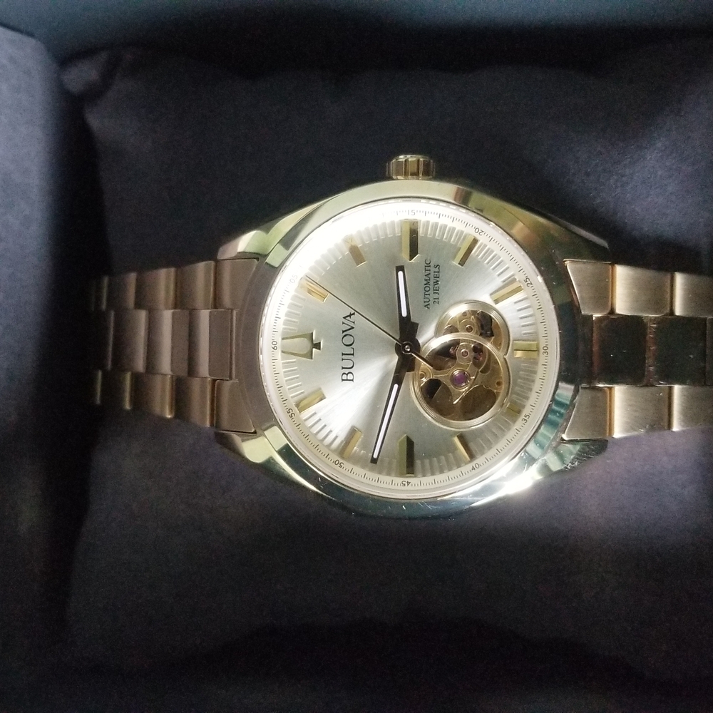 Bulova Gold Bag with Elegant Design